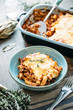 © Ina Peters Photographie/Stocksy - Food: Casserole with maccharoni, veggie bolognese and cheese
