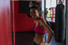 Smiling Black Woman During A Boxe Training