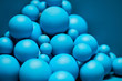 © 365mm/Stocksy - Abstraction of blue spheres in pile