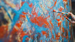 © Gorodenkoff - Close-up Shot of Female Artist Hand, Holding Paint Brush and Drawing Painting with Red Paint. Colorful, Emotional Oil Painting. Contemporary Painter Creating Modern Abstract Piece of Fine Art