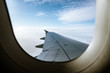 © zocky/Stocksy - View Out Of Airplane Window At Sky