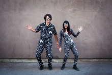 Couple Wearing Googly Eye Suits