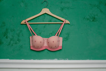Bra Hanging On A Wall