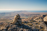 Fototapeta Natura - Pile of stones on the mountain