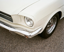 Part Of The Front Of A Vintage American Car
