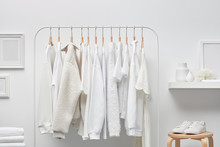 Interior Of White Cloakroom With Rack