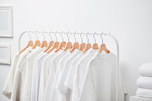 White Shirts And Tops On Hangers