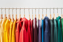 Rainbow Colored Clothes On Rack