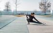 © MEM Studio/Stocksy - Active woman in sports wear stretching