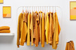 © 365mm/Stocksy - Bright colored clothes on rack