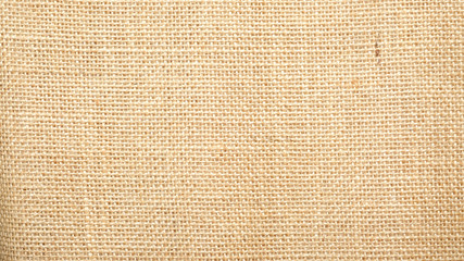 Wall Mural - Hessian sackcloth burlap woven texture background  / cotton woven fabric background with flecks of varying colors of beige and brown. with copy space. office desk concept.