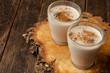 Indian masala chai on rustic wooden table. two