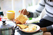 Multi-toast bread and fried eggs on a dish in breakfast set close up. breakfast on the table, 