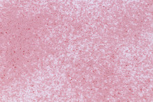 A Pattern Made Of Soft Pink Sand With Crimson Tiny Particles Scattered On White Background