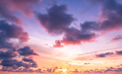 Wall Mural - dramatic autumn sunset with twilight color sky and clouds background