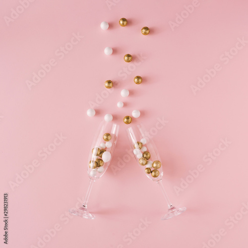 Champagne Glasses Filled With Golden And White Glitter Decoration