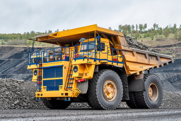 Quarry truck carries coal mined.