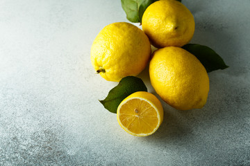 Poster - Fresh lemons with green leaves