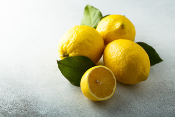 Poster - Fresh lemons with green leaves