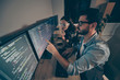 © deagreez - Profile photo of it specialist guy lady two business people late night coworking watch direct monitor bugs testing java script code geek crazy professionals office indoors