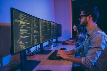 Poster - Profile photo of it specialist two people guy lady business people night hard-working together sitting chairs monitors testing system secure code using server office indoors