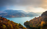 Fototapeta  - Autumn morning on the river surrounded by mountains. Danube river in Djerdap national park in Serbia on Romanian Border.