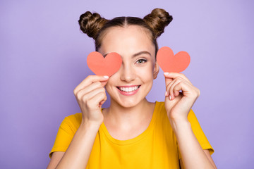 Sticker - Close up photo of amazing lady holding little paper heart postcards hiding eye shy to speak with handsome guy wear yellow t-shirt isolated on pastel purple background