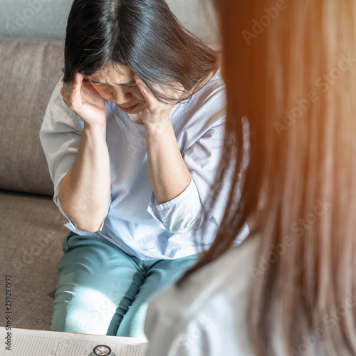 Fotomural Headache, migraine patient, stressful depressed menopause ageing woman with anxi