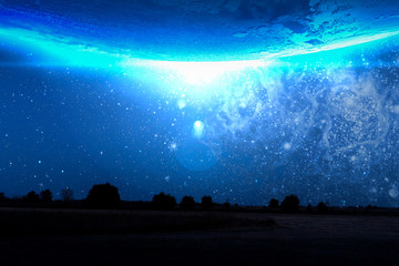 Wall Mural - the stars in the sky above the wild nature field landscape. elements of this image furnished by nasa