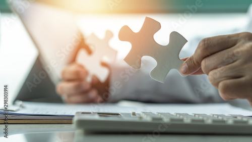 Cuadros en Lienzo Business solution and strategy for corporate business success concept with jigsa