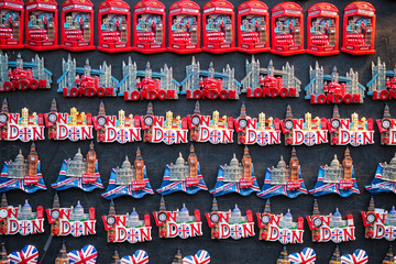 Souvenir London fridge magnets on display at Christmas market winter wonderland in London