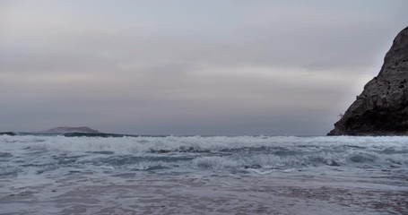 Wall Mural - storm at sea, big waves roll ashore