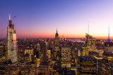 Fototapeta Nowy Jork - New York City skyline with cityscape and skyscraper in Manhattan at sunset.