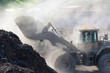 © Albrecht Weiﬂer/Westend61 - Germany, Baden-Wurttemberg, incinerator TREA Breisgau, wheel loader loading scrap