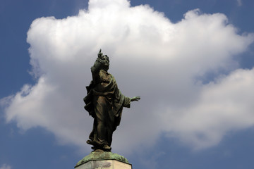 Wall Mural - jesus statue with blue sky