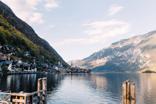 View Of Austrian Town Of Hallstatt Is Surrounded By A Lake And  Alps