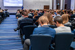 © borisblik - Image of a conference that takes place in a large conference room, workshop for young professionals, training in a large conference room, adult training