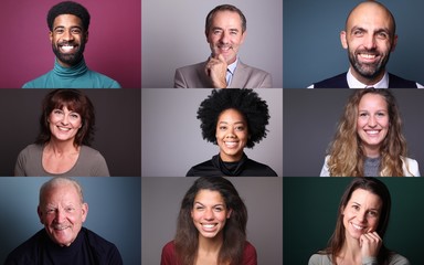 Group of 9 beautiful people in front of a background