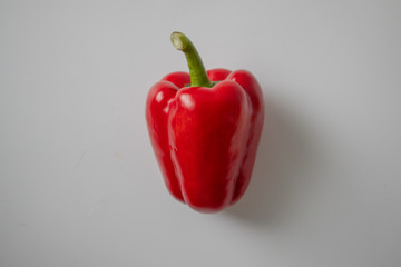 One fresh red bell peper