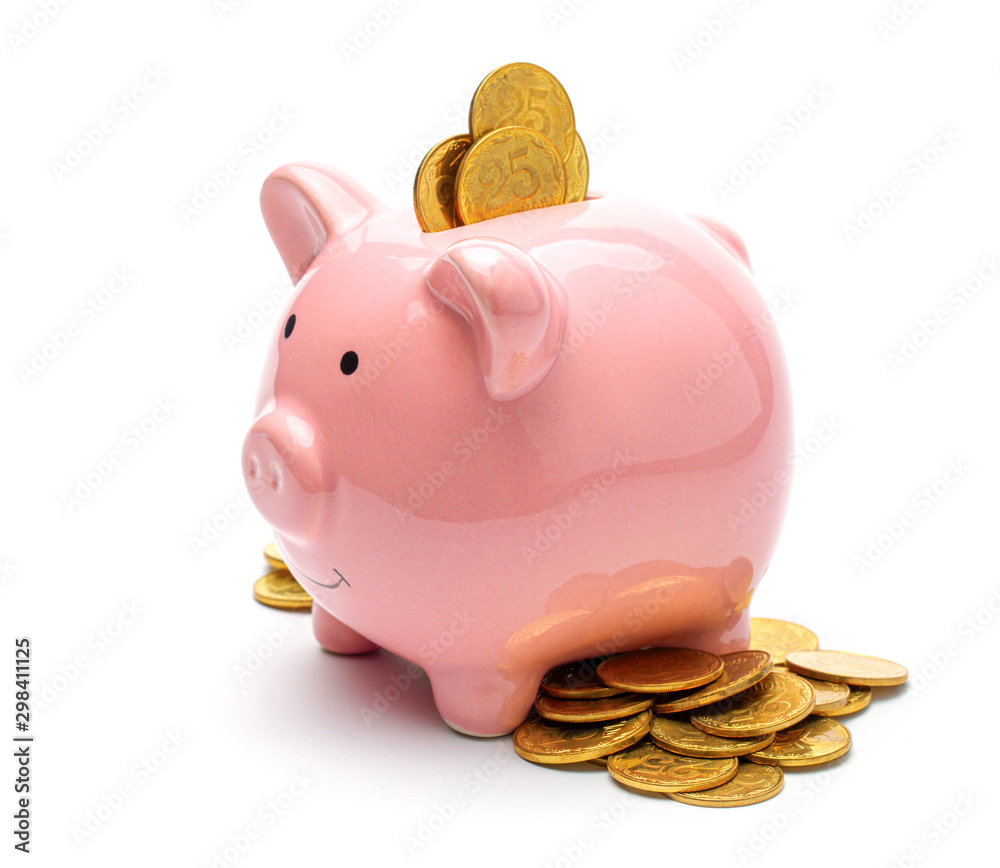 Pink piggy bank full of gold coins isolated on a white background ...