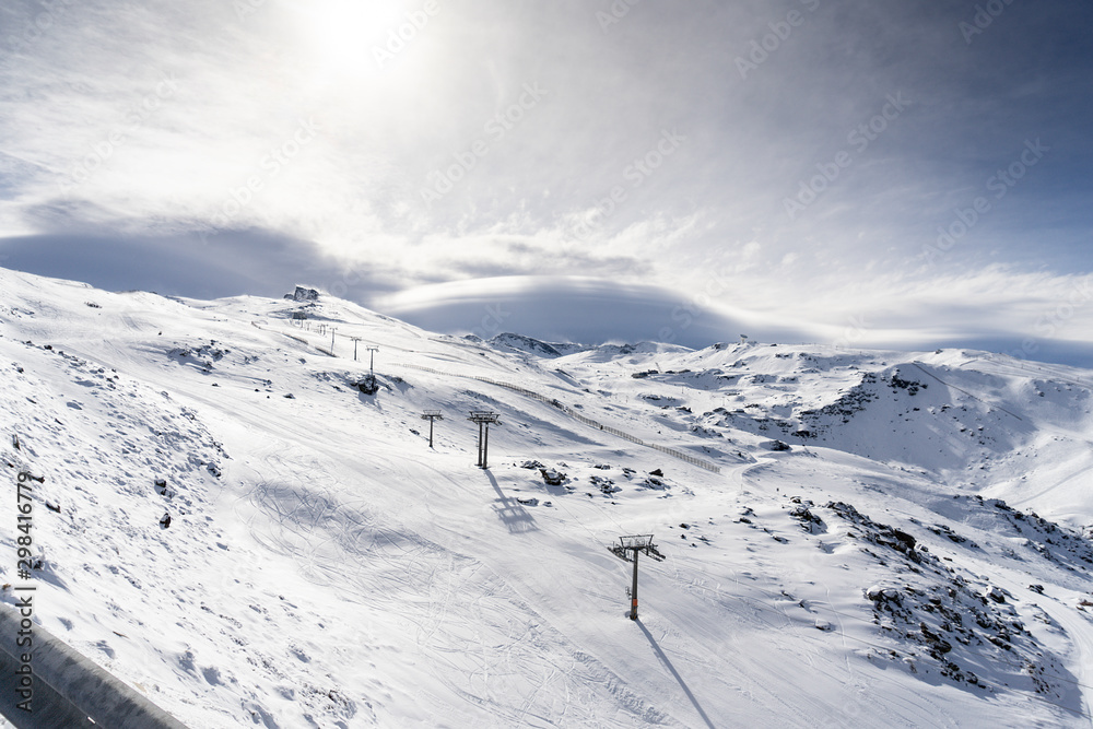 Ski resort of Sierra Nevada in winter, full of snow. - obrazy, fototapety, plakaty 