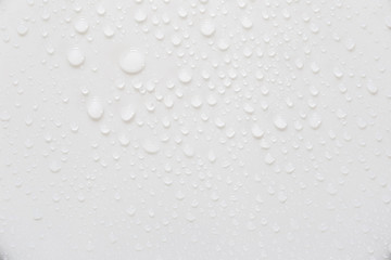 Fototapete - Raindrops on a grayish white background. Rainy season concept.