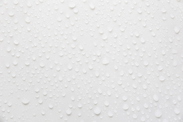 Fototapete - Raindrops on a grayish white background. Rainy season concept.