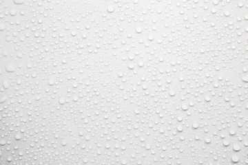 Fototapete - Raindrops on a grayish white background. Rainy season concept.