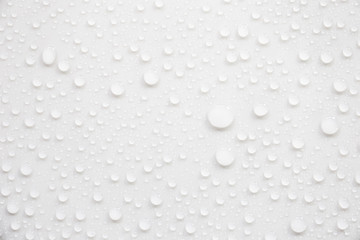 Fototapete - Raindrops on a grayish white background. Rainy season concept.