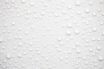 Fototapete - Raindrops on a grayish white background. Rainy season concept.