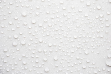 Fototapete - Raindrops on a grayish white background. Rainy season concept.