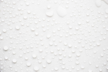 Fototapete - Raindrops on a grayish white background. Rainy season concept.