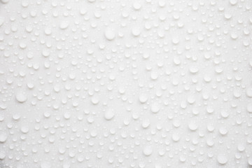 Fototapete - Raindrops on a grayish white background. Rainy season concept.