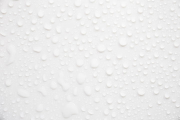Fototapete - Raindrops on a grayish white background. Rainy season concept.